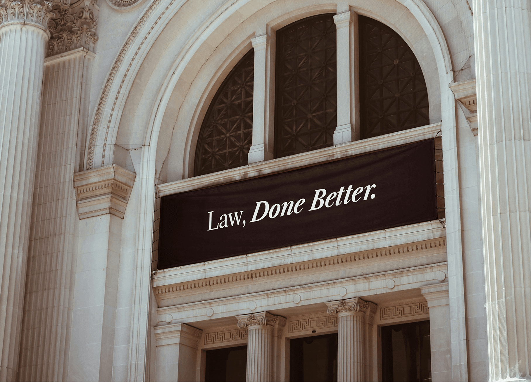 Manifest Law facade with "Law, Done Better" signage
