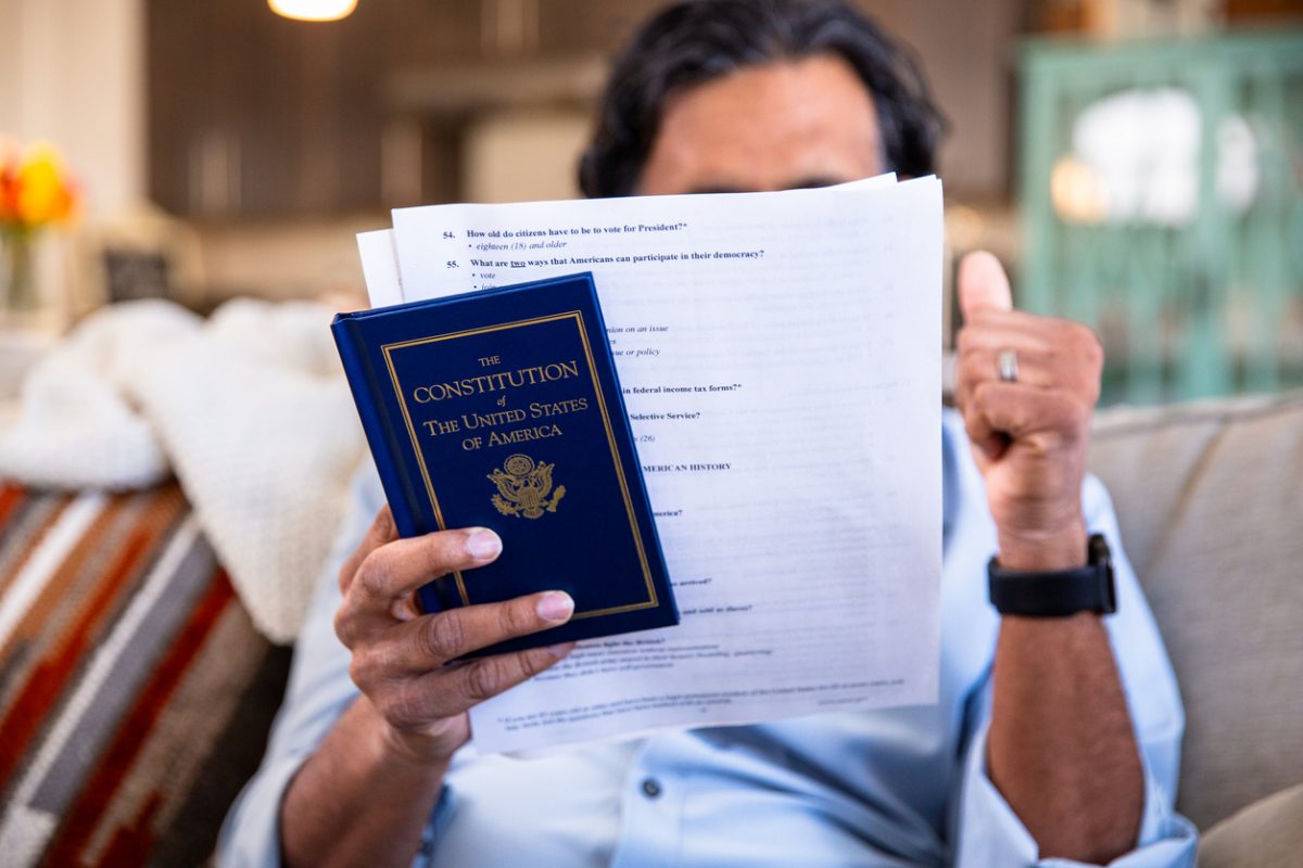 Person studying for the U.S. naturalization test.